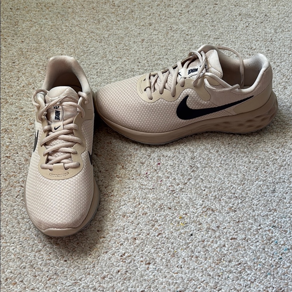 Nike Beige Sneakers with Black Swoosh